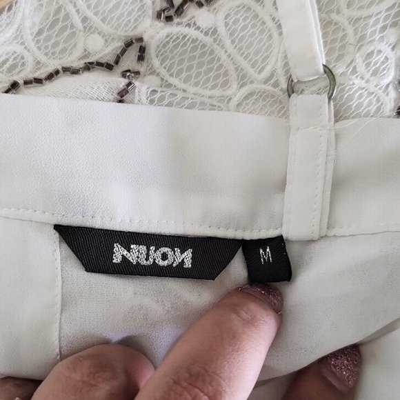 Nuon white crop top with cut off buttoned back and beads work on and lining in - Picture 6 of 6